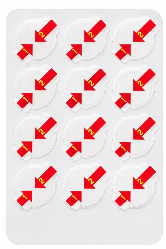 Sheet of 12 clear hydrocolloid acne patches with red arrow design numbered 1 and 2 for easy peel and apply touch free hygienic application on white background.